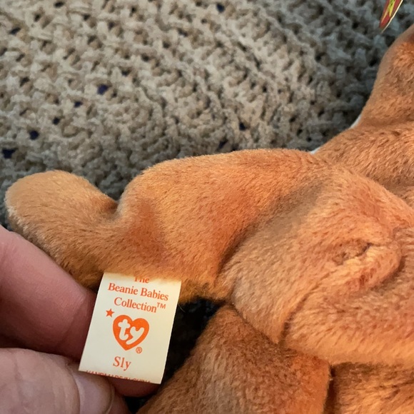 Sly the fox beanie baby. Never played with or displayed. - Picture 8 of 9